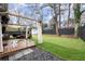 Beautiful backyard with deck, pergola, privacy fence and manicured lawn at 541 Benmac Se Rd, Smyrna, GA 30080