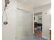 Bathroom with a modern glass shower and doorway leading to a bedroom with decor at 541 Benmac Se Rd, Smyrna, GA 30080