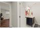 Bright bathroom with a sleek vanity, stylish lighting, and convenient access to other rooms at 541 Benmac Se Rd, Smyrna, GA 30080