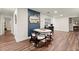 Charming dining area featuring a modern table, chairs, stylish decor, and luxury vinyl flooring at 541 Benmac Se Rd, Smyrna, GA 30080