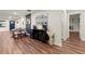 Open-concept dining area with stylish decor, a built-in bar, and seamless flow to other spaces at 541 Benmac Se Rd, Smyrna, GA 30080