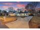 Charming home with a long driveway and a welcoming front porch at 541 Benmac Se Rd, Smyrna, GA 30080