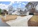 Quaint home nestled on a spacious lot with a long driveway and mature trees at 541 Benmac Se Rd, Smyrna, GA 30080