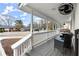 Inviting front porch with comfortable seating, perfect for enjoying the outdoors at 541 Benmac Se Rd, Smyrna, GA 30080