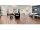 Open living space featuring hardwood floors, stylish decor, and a seamless transition to the dining area at 541 Benmac Se Rd, Smyrna, GA 30080