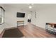 Living room featuring sleek floors, and ample natural light from large windows at 541 Benmac Se Rd, Smyrna, GA 30080