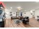 Comfortable living area with a cozy sectional, hardwood floors, and plenty of natural light at 541 Benmac Se Rd, Smyrna, GA 30080