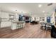 Bright and airy open-concept living space featuring a modern kitchen, dining area, and cozy living room at 541 Benmac Se Rd, Smyrna, GA 30080