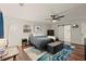 Main bedroom features a ceiling fan and sliding closet door at 541 Benmac Se Rd, Smyrna, GA 30080