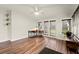 Sunroom with hardwood floors, ample windows and a view of the backyard at 541 Benmac Se Rd, Smyrna, GA 30080