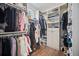 Spacious walk-in closet with ample storage and custom shelving at 8540 Hope Mews Ct, Atlanta, GA 30350