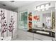 Bright bathroom with modern vanity, black countertop, and a shower with a decorative curtain at 2316 Defoors Ferry Nw Rd, Atlanta, GA 30318