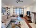 Cozy living room boasts stylish sliding doors, comfortable sofa, fireplace, and modern decor at 2316 Defoors Ferry Nw Rd, Atlanta, GA 30318