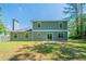 Exterior of house showcasing a well-maintained backyard and home siding at 3534 S Portsmouth Cir, Lithonia, GA 30038