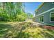 Spacious backyard with a concrete patio, perfect for outdoor entertaining and relaxation at 3534 S Portsmouth Cir, Lithonia, GA 30038