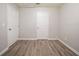 Bedroom featuring modern wood-look flooring, perfect for relaxation and style at 3534 S Portsmouth Cir, Lithonia, GA 30038