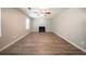 Spacious living room exhibiting a fireplace, neutral walls, durable flooring, and natural light at 3534 S Portsmouth Cir, Lithonia, GA 30038