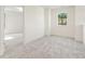 Neutral bedroom with gray carpet, white walls, and trim at 727 Crest Line W Trl, Powder Springs, GA 30127