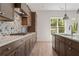 Gourmet kitchen featuring granite countertops, stainless steel appliances, and sleek cabinetry at 727 Crest Line W Trl, Powder Springs, GA 30127