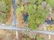 Aerial view of the home showcasing its position on a tree-lined street at 806 Longfellow Ct, Stone Mountain, GA 30088