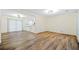 Spacious living room with hardwood flooring and sliding glass doors at 806 Longfellow Ct, Stone Mountain, GA 30088