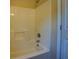 Full bathroom with tub shower combo and white shower head fixture at 105 Bentley Place Way, Covington, GA 30016