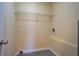 Empty closet with laminate floor and lots of open space at 105 Bentley Place Way, Covington, GA 30016