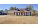 Charming single Gathering home with a well-maintained lawn and inviting curb appeal at 105 Bentley Place Way, Covington, GA 30016