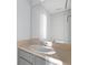 Bathroom featuring a sink with cabinet storage, ensuring functionality and storage at 1116 Oak Hollow Ln, Hampton, GA 30228