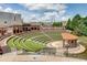 Beautiful outdoor amphitheater with lush green seating and a modern stage area at 1238 Ainsworth Aly # 38, Sugar Hill, GA 30518