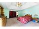 Large bedroom with a tray ceiling and space for bedroom furniture at 1505 Ozora Rd, Loganville, GA 30052