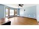 Bedroom featuring a bay window for plenty of light, a ceiling fan, and a view of the outdoors at 1505 Ozora Rd, Loganville, GA 30052