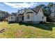 Charming two-story home with large front yard and bay windows at 1505 Ozora Rd, Loganville, GA 30052