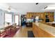 Eat-in kitchen featuring wooden cabinets, stainless steel appliances, and a breakfast bar at 1505 Ozora Rd, Loganville, GA 30052