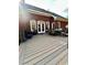 Spacious back deck features a dining table and chairs, perfect for outdoor entertaining at 3585 Shepherds Ln, Loganville, GA 30052