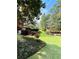 Lush green backyard and landscape design at 3585 Shepherds Ln, Loganville, GA 30052