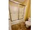 Bathroom featuring a shower-tub combination at 3585 Shepherds Ln, Loganville, GA 30052