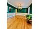 Formal dining room boasting hardwood floors, sophisticated paint colors, and decorative chandelier at 3585 Shepherds Ln, Loganville, GA 30052