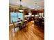 Eat-in kitchen featuring stainless appliances, wood cabinetry, and granite countertops at 3585 Shepherds Ln, Loganville, GA 30052