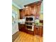 Kitchen features a built-in stainless oven, microwave and dark granite countertops at 3585 Shepherds Ln, Loganville, GA 30052