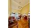 Spacious living room with vaulted ceilings, hardwood floors, fireplace, and comfortable seating at 3585 Shepherds Ln, Loganville, GA 30052