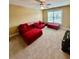 Cozy living room with plush carpeting and a comfortable seating area at 3585 Shepherds Ln, Loganville, GA 30052