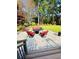 Stone patio features outdoor seating, perfect for entertaining in a lush backyard at 3585 Shepherds Ln, Loganville, GA 30052