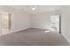 Bright bedroom with ceiling fan and ensuite bathroom featuring modern finishes at 723 Crest Line W Trl, Powder Springs, GA 30127