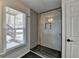 Shower behind glass with gray tile and black hardware, adjacent to a window at 10815 Donamere Dr, Johns Creek, GA 30022