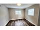 Cozy bedroom featuring modern vinyl plank floors and a sunlit window at 2653 Williamsburg Dr, Decatur, GA 30034