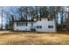 Charming two-story home with a well-maintained yard and delightful blue front door at 2653 Williamsburg Dr, Decatur, GA 30034