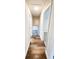 A hallway with newly finished floors connecting the upstairs rooms at 2653 Williamsburg Dr, Decatur, GA 30034