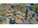Aerial view of the property displaying the home, landscaping, nearby houses and mature trees at 2805 Roxburgh Dr, Roswell, GA 30076