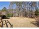 Large backyard featuring mature trees and an expansive lawn at 2805 Roxburgh Dr, Roswell, GA 30076